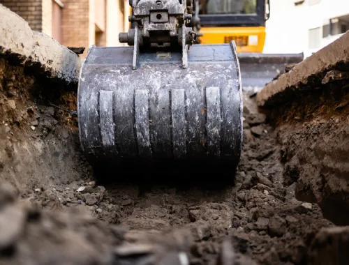 Groundworks crew setting foundations and drainage