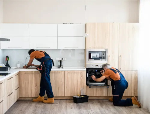 Fitted kitchen installation with precise cabinetry