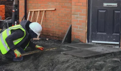 Construction team in Wednesbury carrying out groundworks and foundation preparation in an area with historic coal mining activity.