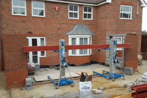 Steel beam installation forming an open-plan space